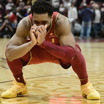 Feb 12, 2024; Cleveland, Ohio, USA; Cleveland Cavaliers guard Donovan Mitchell (45) reacts after guard Darius Garland (not pictured) missed a game winning basket during the second half against the Philadelphia 76ers at Rocket Mortgage FieldHouse. Mandatory Credit: Ken Blaze-USA TODAY Sports
