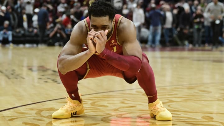 Feb 12, 2024; Cleveland, Ohio, USA; Cleveland Cavaliers guard Donovan Mitchell (45) reacts after guard Darius Garland (not pictured) missed a game winning basket during the second half against the Philadelphia 76ers at Rocket Mortgage FieldHouse. Mandatory Credit: Ken Blaze-USA TODAY Sports