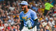 Aug 17, 2024; Milwaukee, Wisconsin, USA; Milwaukee Brewers starting pitcher Freddy Peralta (51) reacts after striking out Cleveland Guardians first baseman Josh Naylor (22) in the sixth inning at American Family Field. Mandatory Credit: Benny Sieu-Imagn Images