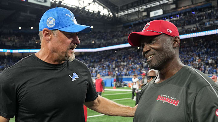 Detroit Lions head coach Dan Campbell talks to Tampa Bay Buccaneers head coach Todd Bowels 