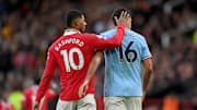 Marcus Rashford y Rodri.