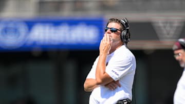 Aug 31, 2024; Nashville, Tennessee, USA;  Virginia Tech Hokies head coach Brent Pry watches from the sideline against the Vanderbilt Commodores during the second half at FirstBank Stadium. Mandatory Credit: Steve Roberts-Imagn Images