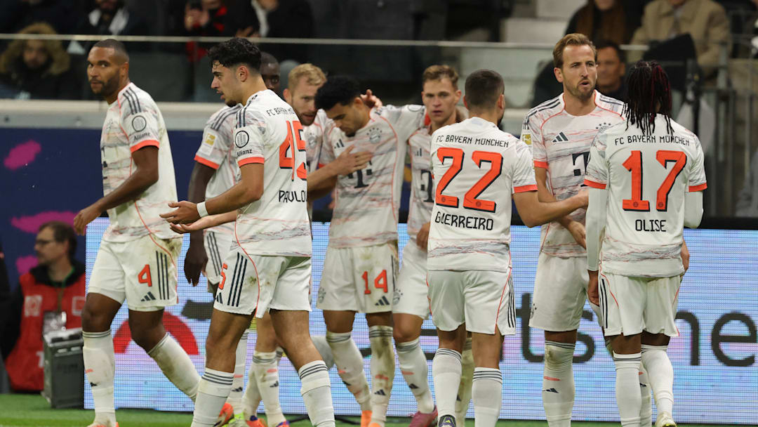 Bayern Munich players celebrating a goal against Eintracht Frankfurt on matchday six of the Bundesliga.