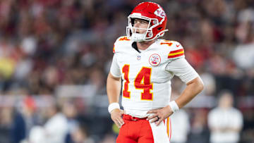 Aug 9, 2025; Glendale, Arizona, USA; Kansas City Chiefs quarterback Bailey Zappe (14) against the Arizona Cardinals during a preseason NFL game at State Farm Stadium. Mandatory Credit: Mark J. Rebilas-Imagn Images