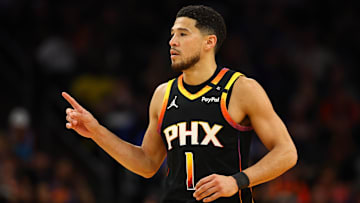 Phoenix Suns guard Devin Booker reacts after a play against the Oklahoma City Thunder.