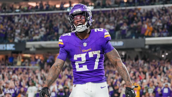 Dec 29, 2024; Minneapolis, Minnesota, USA; Minnesota Vikings running back Cam Akers (27) celebrates his touchdown against Green Bay Packers in the third quarter at U.S. Bank Stadium. Mandatory Credit: Brad Rempel-Imagn Images