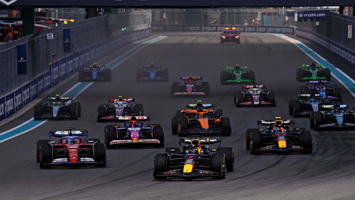 May 4, 2024; Miami Gardens, Florida, USA; Red Bull Racing driver Max Verstappen (1) leads the start of the F1 Sprint Race at Miami International Autodrome. Mandatory Credit: Peter Casey-USA TODAY Sports