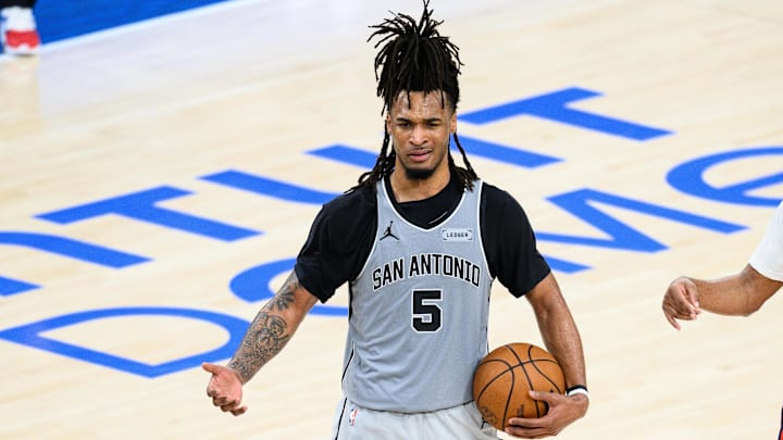 Apr 2, 2026; Inglewood, California, USA; San Antonio Spurs guard Stephon Castle (5) reacts after being called for a foul during the first half against the Los Angeles Clippers at Intuit Dome. Mandatory Credit: William Liang-Imagn Images