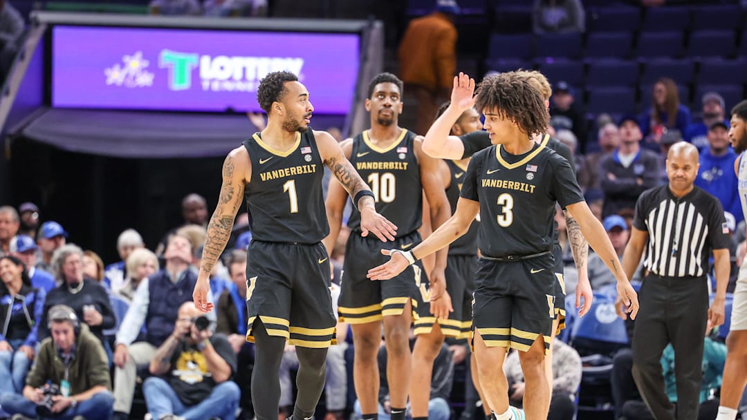 Dec 17, 2025; Memphis, Tennessee, USA; Vanderbilt Commodores guards Frankie Collins (1) and Tyler Tanner (3) high five during the second half against the Memphis Tigers at FedExForum. Mandatory Credit: Wesley Hale-Imagn Images Dec 17, 2025; Memphis, Tennessee, USA; Vanderbilt Commodores guards Frankie Collins (1) and Tyler Tanner (3) high five during the second half against the Memphis Tigers at FedExForum. Mandatory Credit: Wesley Hale-Imagn Images