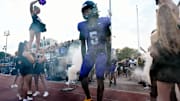 Lipscomb Academy's C.J. Jimcoily (5) runs onto the field before an high school football game against Thompson Thursday, Aug. 29, 2024, in Nashville, Tenn.