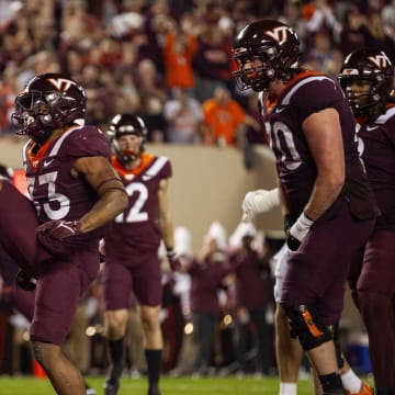 Oct 26, 2023; Blacksburg, Virginia, USA; Virginia Tech Hokies running back Bhayshul Tuten (33) celebrates after scoring a touchdown during the second quarter against the Syracuse Orange at Lane Stadium. Mandatory Credit: Peter Casey-USA TODAY Sports