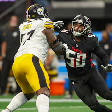 Sep 8, 2024; Atlanta, Georgia, USA; Pittsburgh Steelers offensive tackle Broderick Jones (77) blocks Atlanta Falcons defensive end James Smith-Williams (50) in the second quarter at Mercedes-Benz Stadium. Mandatory Credit: Brett Davis-Imagn Images