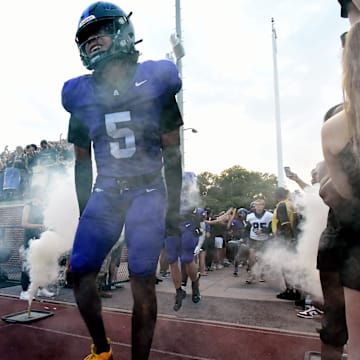 Lipscomb Academy's C.J. Jimcoily (5) runs onto the field before an high school football game against Thompson Thursday, Aug. 29, 2024, in Nashville, Tenn.