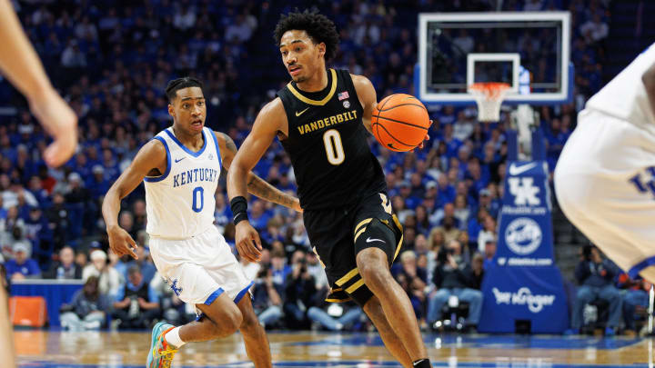 Mar 6, 2024; Lexington, Kentucky, USA; Vanderbilt Commodores guard Tyrin Lawrence (0) handles the ball during the first half against the Kentucky Wildcats at Rupp Arena at Central Bank Center. Mandatory Credit: Jordan Prather-USA TODAY Sports