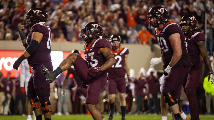 Oct 26, 2023; Blacksburg, Virginia, USA; Virginia Tech Hokies running back Bhayshul Tuten (33) celebrates after scoring a touchdown during the second quarter against the Syracuse Orange at Lane Stadium. Mandatory Credit: Peter Casey-USA TODAY Sports