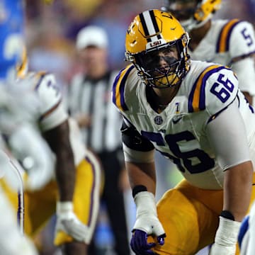Sep 30, 2023; Oxford, Mississippi, USA; LSU Tigers offensive linemen Will Campbell (66) lines up before the snap during the second half  against the Mississippi Rebels at Vaught-Hemingway Stadium. Mandatory Credit: Petre Thomas-Imagn Images