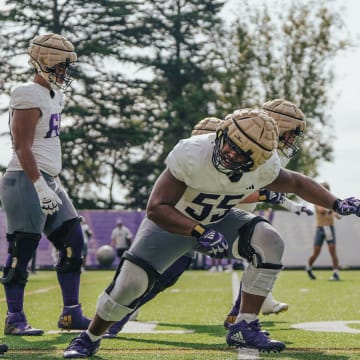 Three players who have put on a lot of Husky, from left, Kahlee Tafai, Soane Faasolo and Michael Levelle Watkins.