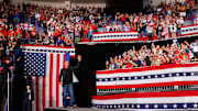 Former Green Bay Packers quarterback Brett Favre takes the stage during a campaign rally for Republican presidential nominee Donald Trump on Wednesday, October 30, 2024, at the Resch Center in Ashwaubenon, Wis. 