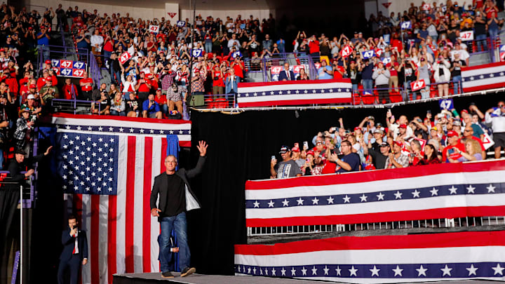 Former Green Bay Packers quarterback Brett Favre takes the stage during a campaign rally for Republican presidential nominee Donald Trump on Wednesday, October 30, 2024, at the Resch Center in Ashwaubenon, Wis. 