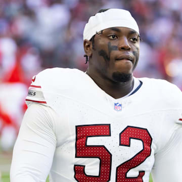 Dec 15, 2024; Glendale, Arizona, USA; Arizona Cardinals linebacker Victor Dimukeje (52) against the New England Patriots at State Farm Stadium.  