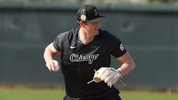 Chicago White Sox prospect Colson Montgomery takes fielding practice during spring training at Camelback Ranch.