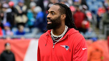 Dec 17, 2023; Foxborough, Massachusetts, USA; New England Patriots linebacker Matthew Judon (9) greets fans before a game against the Kansas City Chiefs at Gillette Stadium.