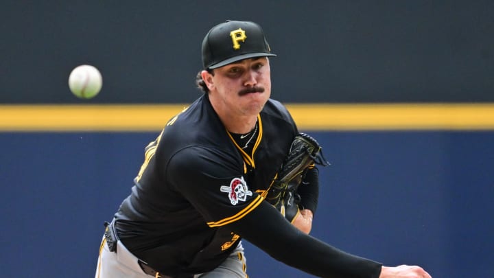 Jul 11, 2024; Milwaukee, Wisconsin, USA; Pittsburgh Pirates starting pitcher Paul Skenes (30) pitches in the first inning against the Milwaukee Brewers at American Family Field. Mandatory Credit: Benny Sieu-USA TODAY Sports