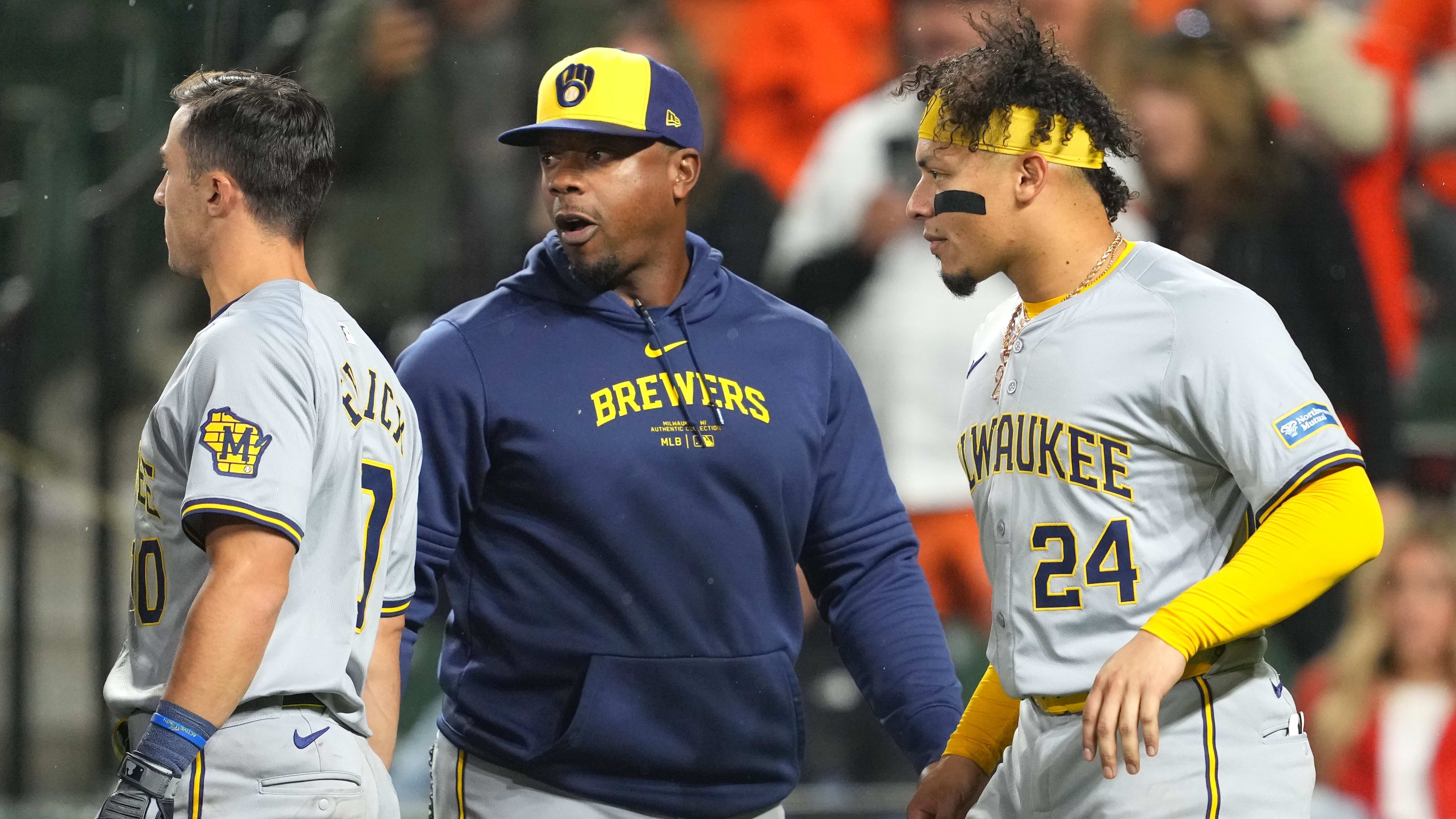 Apr 12, 2024; Baltimore, Maryland, USA; Milwaukee Brewers coach Rickie Weeks Jr. (center).