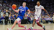 Stirtz drives against Kansas State guard C.J. Jones during a game in December.