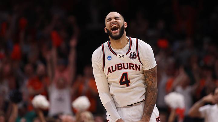 Mar 30, 2025; Atlanta, GA, USA; Auburn Tigers forward Johni Broome (4) celebrates after a play during the second half in the South Regional final of the 2025 NCAA tournament against the Michigan State Spartans at State Farm Arena. Mandatory Credit: Brett Davis-Imagn Images