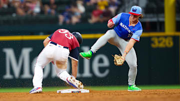 Jul 13, 2024; Arlington, TX, USA;  American League Future  outfielder Spencer Jones (93) steals second base ahead of the tag by National League Future  infielder Aidan Miller (10) during the fourth inning during the Major league All-Star Futures game at Globe Life Field.  Mandatory Credit: Kevin Jairaj-Imagn Images