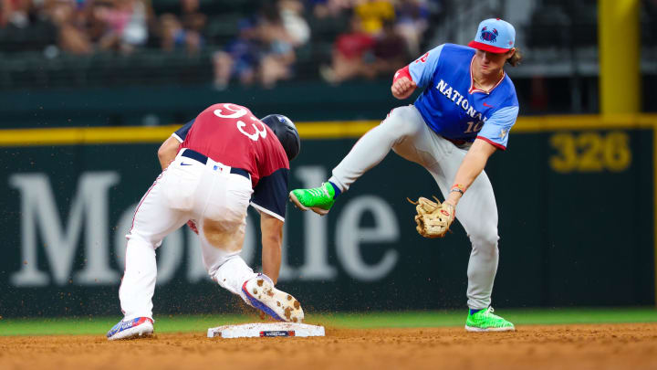 Jul 13, 2024; Arlington, TX, USA;  American League Future  outfielder Spencer Jones (93) steals second base ahead of the tag by National League Future  infielder Aidan Miller (10) during the fourth inning during the Major league All-Star Futures game at Globe Life Field. 