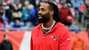 Dec 17, 2023; Foxborough, Massachusetts, USA; New England Patriots linebacker Matthew Judon (9) greets fans before a game against the Kansas City Chiefs at Gillette Stadium. Mandatory Credit: Eric Canha-USA TODAY Sports