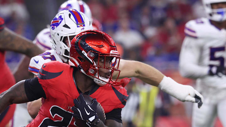 Nov 20, 2025; Houston, Texas, USA;  Houston Texans running back Woody Marks (27) runs against the Buffalo Bills in the second half at NRG Stadium. Mandatory Credit: Troy Taormina-Imagn Images