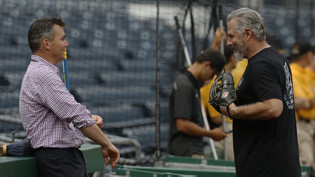 Aug 11, 2021; Pittsburgh, Pennsylvania, USA; Pittsburgh Pirates general manager Ben Cherington (left) talks with manager Derek Shelton (right) during batting practice before the game against the St. Louis Cardinals at PNC Park. Mandatory Credit: Charles LeClaire-Imagn Images