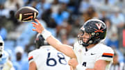Oct 25, 2025; Chapel Hill, North Carolina, USA; Virginia Cavaliers quarterback Chandler Morris (4) passes the ball in the fourth quarter at Kenan Stadium. Mandatory Credit: Bob Donnan-Imagn Images