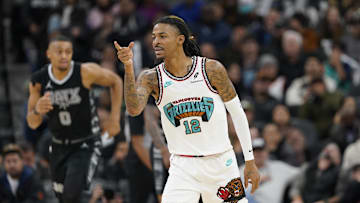 Jan 15, 2025; San Antonio, Texas, USA; Memphis Grizzlies guard Ja Morant (12) reacts after scoring a three point basket during the second half at Frost Bank Center. Mandatory Credit: Scott Wachter-Imagn Images
