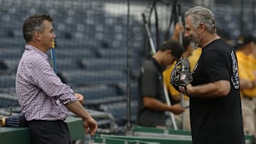 Aug 11, 2021; Pittsburgh, Pennsylvania, USA; Pittsburgh Pirates general manager Ben Cherington (left) talks with manager Derek Shelton (right) during batting practice before the game against the St. Louis Cardinals at PNC Park. Mandatory Credit: Charles LeClaire-Imagn Images