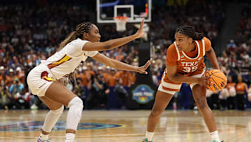 Texas Longhorns forward Madison Booker (35) controls the ball against South Carolina Gamecocks forward Sania Feagin (20) during the 2025 NCAA tournament, April 4, 2025 at Amalie Arena in Tampa, Florida.