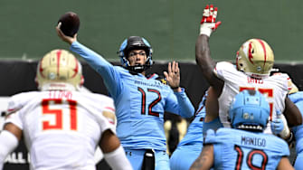 Mar 30, 2024; Arlington, TX, USA; Arlington Renegades quarterback Luis Perez (12) passes for a touchdown to wide receiver Isaiah Winstead (not pictured) during the first half against the Birmingham Stallions at Choctaw Stadium. Mandatory Credit: Jerome Miron-Imagn Images