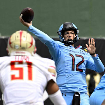 Mar 30, 2024; Arlington, TX, USA; Arlington Renegades quarterback Luis Perez (12) passes for a touchdown to wide receiver Isaiah Winstead (not pictured) during the first half against the Birmingham Stallions at Choctaw Stadium. Mandatory Credit: Jerome Miron-Imagn Images