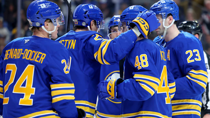 Mar 27, 2025; Buffalo, New York, USA;  Buffalo Sabres center Tyson Kozak (48) celebrates his goal with teammates during the second period against the Pittsburgh Penguins at KeyBank Center. Mandatory Credit: Timothy T. Ludwig-Imagn Images