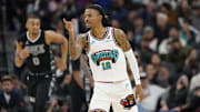 Jan 15, 2025; San Antonio, Texas, USA; Memphis Grizzlies guard Ja Morant (12) reacts after scoring a three point basket during the second half at Frost Bank Center. Mandatory Credit: Scott Wachter-Imagn Images