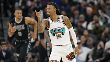 Jan 15, 2025; San Antonio, Texas, USA; Memphis Grizzlies guard Ja Morant (12) reacts after scoring a three point basket during the second half at Frost Bank Center. Mandatory Credit: Scott Wachter-Imagn Images