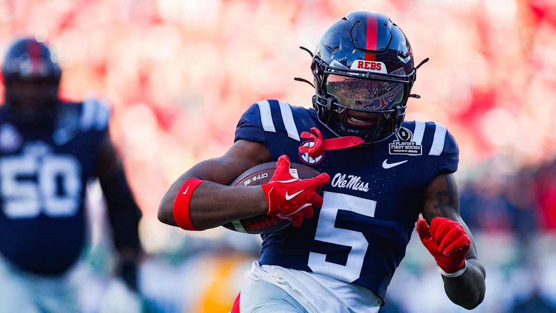 Dec 20, 2025; Oxford, MS, USA; Mississippi Rebels running back Kewan Lacy (5) carries the ball for a touchdown against the Tulane Green Wave during the first half of a game at Vaught-Hemingway Stadium. Mandatory Credit: Petre Thomas-Imagn Images Dec 20, 2025; Oxford, MS, USA; Mississippi Rebels running back Kewan Lacy (5) carries the ball for a touchdown against the Tulane Green Wave during the first half of a game at Vaught-Hemingway Stadium. Mandatory Credit: Petre Thomas-Imagn Images