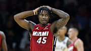 Nov 26, 2025; Miami, Florida, USA; Miami Heat guard Davion Mitchell (45) stands on the court during a time out against the Milwaukee Bucks during the first half of an NBA Cup game at Kaseya Center. Mandatory Credit: Rhona Wise-Imagn Images