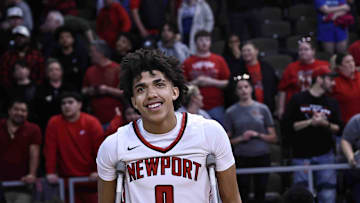Newport's Taylen Kinney reacts after Newport's Ninth Region championship win over Cooper Tuesday, March 12, 2024. Kinney was injured in the first half.