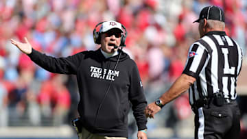 Nov 4, 2023; Oxford, Mississippi, USA; Texas A&M Aggies head coach Jimbo Fisher reacts  during the first half against the Mississippi Rebels at Vaught-Hemingway Stadium. Mandatory Credit: Petre Thomas-Imagn Images