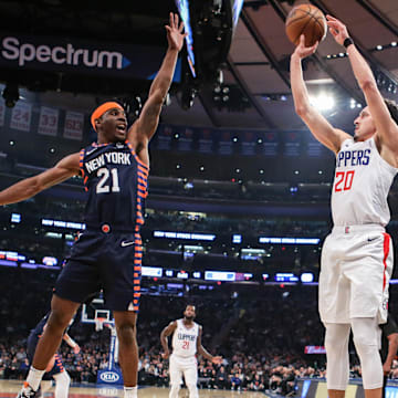 New York Knicks guard Damyean Dotson (21) and Los Angeles Clippers guard Landry Shamet (20) at Madison Square Garden.