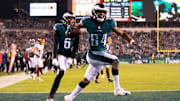 Dec 21, 2021; Philadelphia, Pennsylvania, USA; Philadelphia Eagles wide receiver Greg Ward (84) celebrates in front of wide receiver DeVonta Smith (6) after his touchdown catch against the Washington Football Team during the fourth quarter at Lincoln Financial Field. Mandatory Credit: Bill Streicher-Imagn Images
